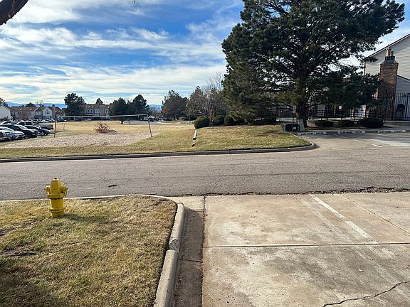 Bright corner unit with designated parking in front