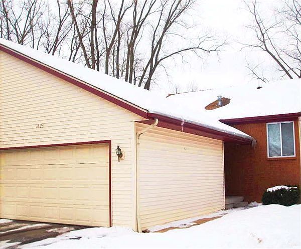 Brick exterior and vinyl siding.  Two stall garage.