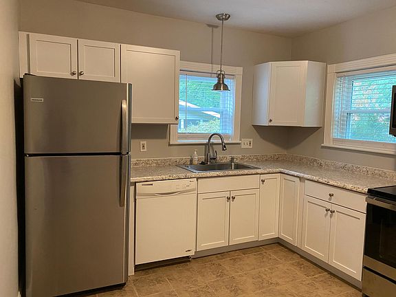 Kitchen: new cabinets, countertops and stainless appliances.