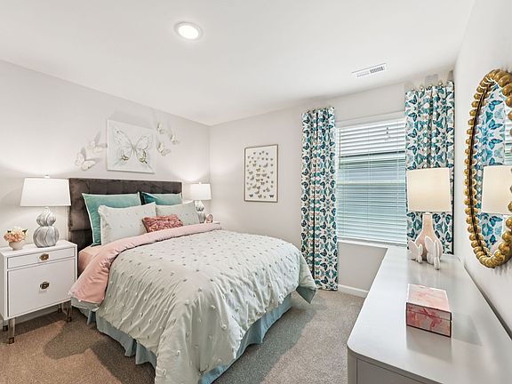 Secondary bedroom in the Taylorsville floorplan at a Meritage Homes community in Mebane, NC.