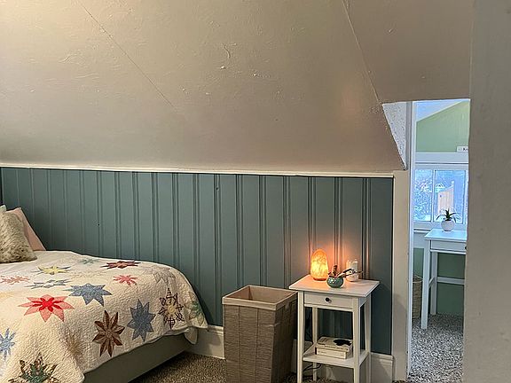 Bedroom with door to alcove
