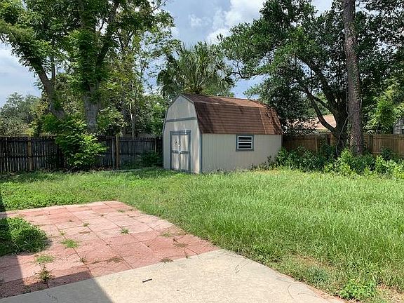 Back yard with large storage