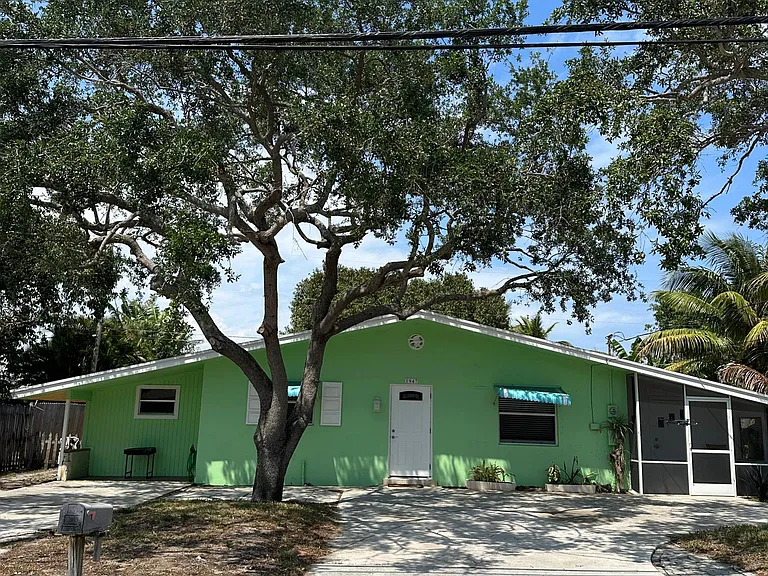 Small multi-unit on shaded lot.