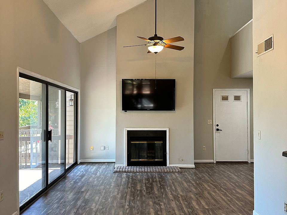 Main open living area fireplace with gas and 60 inch TV