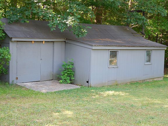 Larger of 2 wired sheds