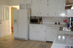 Upstairs kitchen area with lots of cabinets