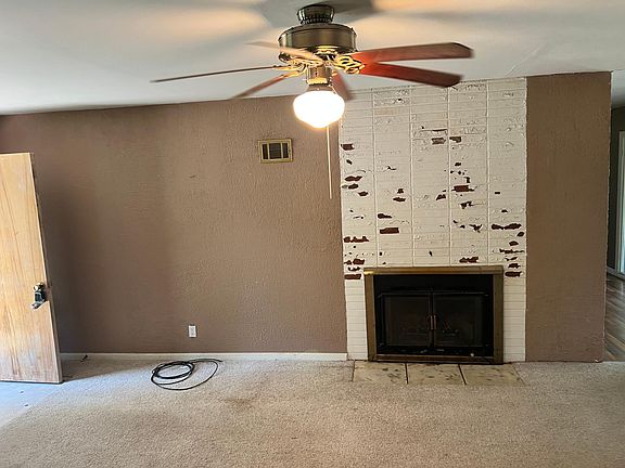 Living Room pic #2. Wood-burning fireplace