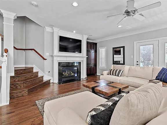 Open concept living room. Balcony and Grill off the living room