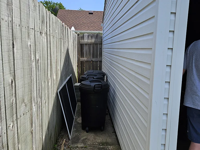 Storage behind garage.