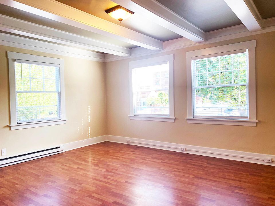 Lots of Windows, Boxed-Beam Ceilings.