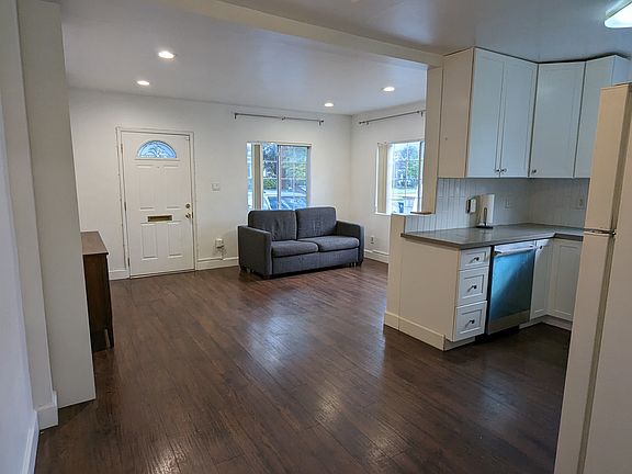 Living room and kitchen and front door
