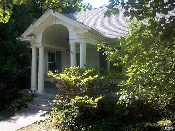 View of the main entrance portico from the front yard...
