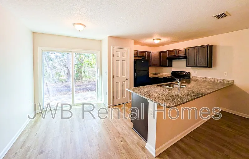 Building Photo - 7840 Playschool Ln