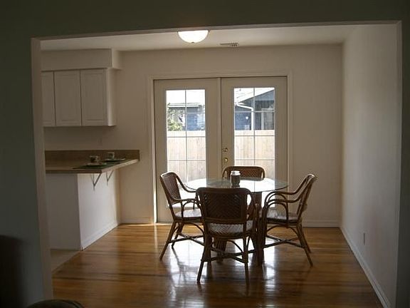 dining area - french doors open on to deck