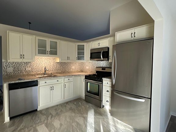 Beautiful modern kitchen with stainless steel appliances