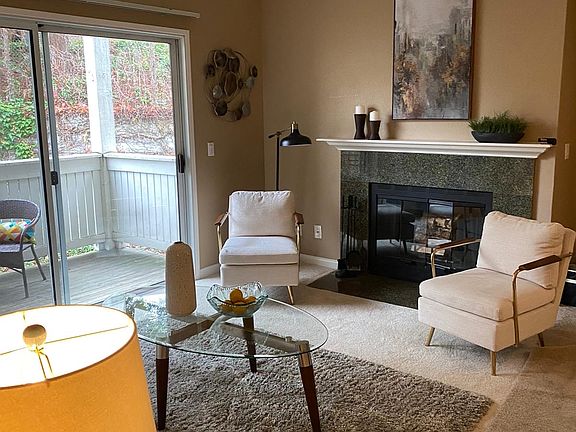 Living room of the unit with staging. The apartment is unfurnished.