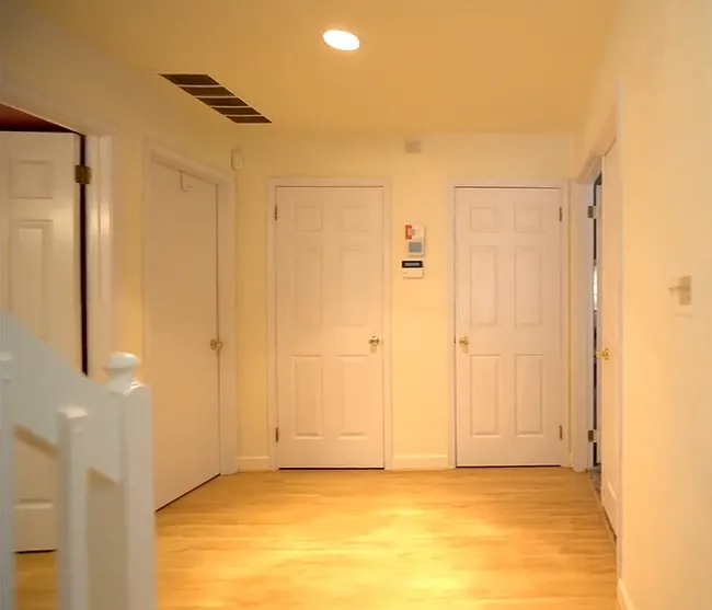 linen & coat closets. garage entrance, 1/2 bathroom