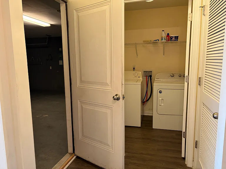 Garage to the doorway on the left, and laundry room up front.