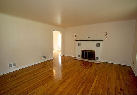 Hardwoods and fireplace in Living room