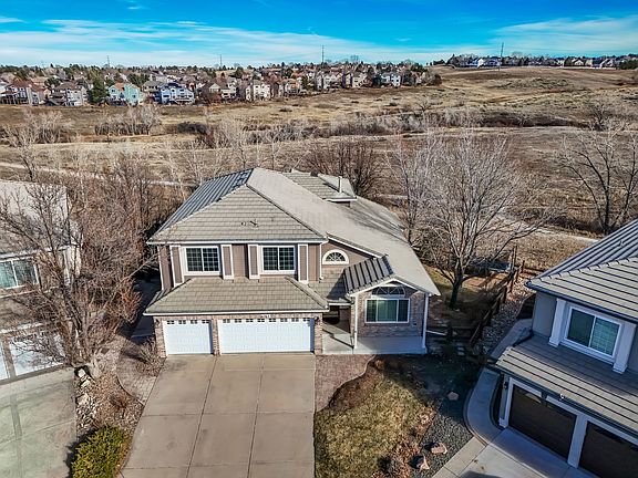Set on a premium lot, this beautiful home backs to expansive open space, offering rare privacy and sweeping views that create a serene, retreat-like setting.