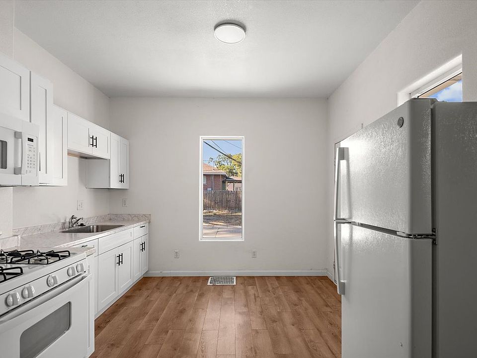 FULL SIZE KITCHEN WITH BACK DOOR ACCESS.