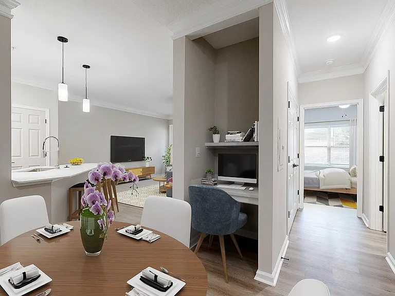 Open floor plan view of dining room and built in desk