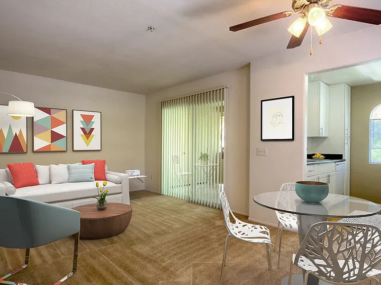 Carpeted Living Room with Balcony