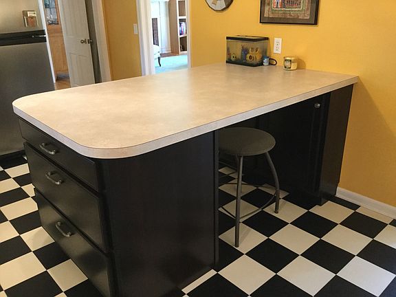 Other view of unique island center with drawers and storage