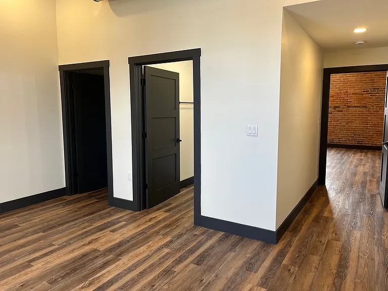Primary bedroom with private bathroom and walk in closet