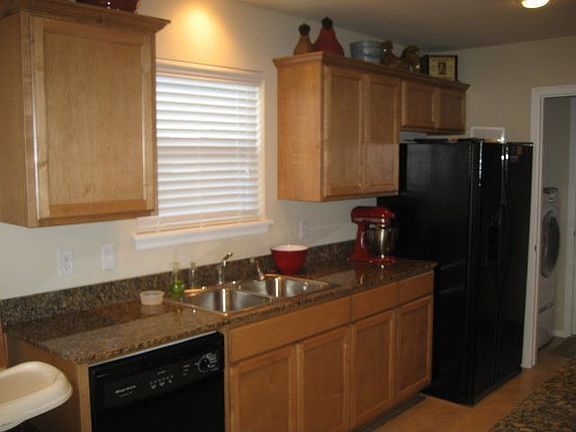 Granite counters and tile floors.