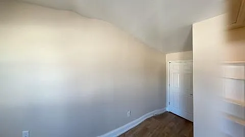 Room #2 with closet space with natural lights.