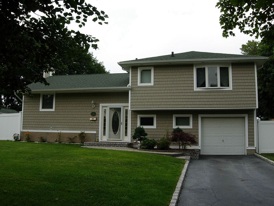 Recently sided, new roof and anderson windows.