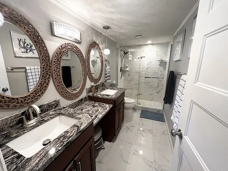 Master Bathroom with Double Vanities and Walk In Shower