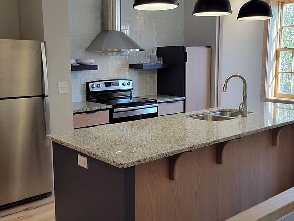 All new stainless steel applicances and hood.