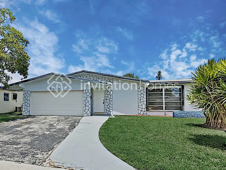 7311 NW 20th St — Photo 1