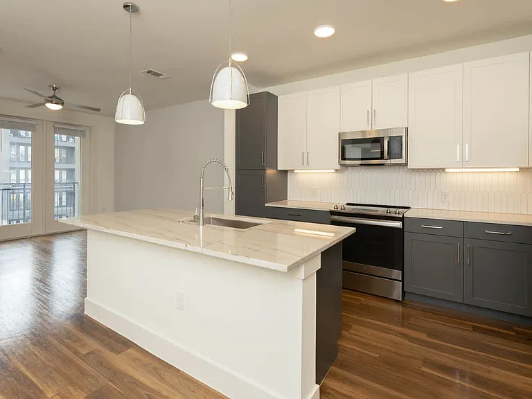 Kitchen with Stainless Steel Appliances and Breakfast Bar