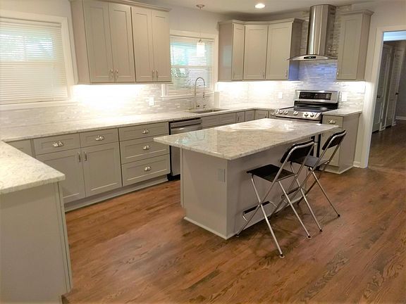 Newly updated kitchen with quiet-close cabinets, granite and