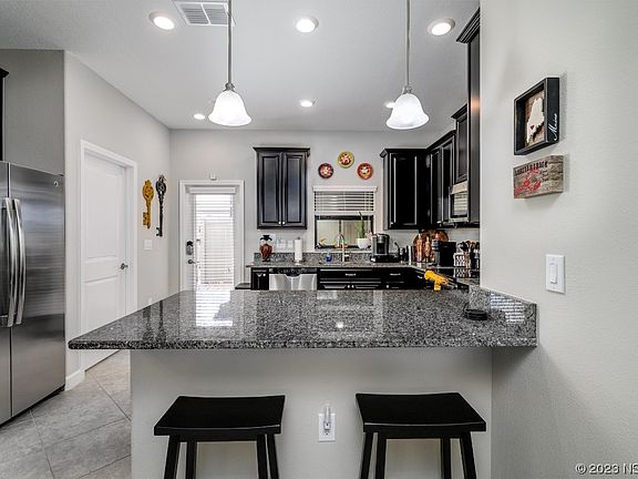 5th image of 28619 Tranquil Lake Cir