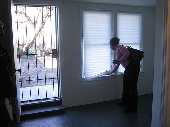 This is the laundry area w/ backyard access & our realtor