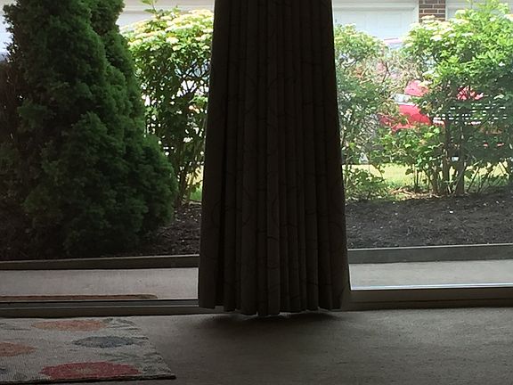 Drapes and blinds included
