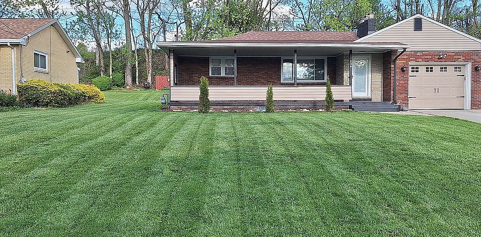 Large front porch and yard