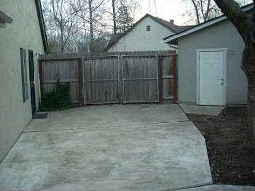 Additional parking in rear yard.