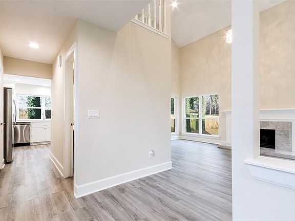 View of Kitchen, Hallway, and Great Room from Foyer Area