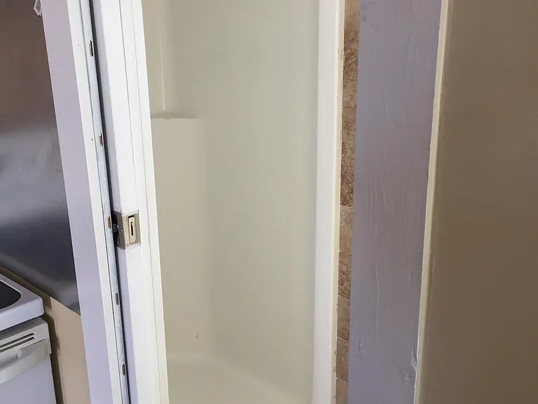 Standing Shower With Glass Door (Glass Door was installed after this photo was taken)
