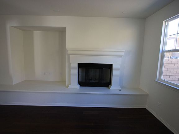 Family Room with Large Media Niche and Fireplace