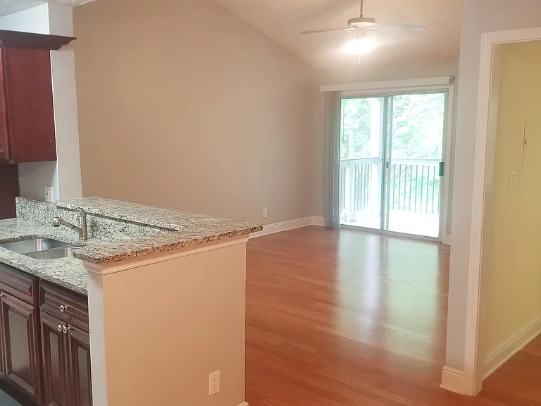 View from Dining Area to Kitchen and Living Room