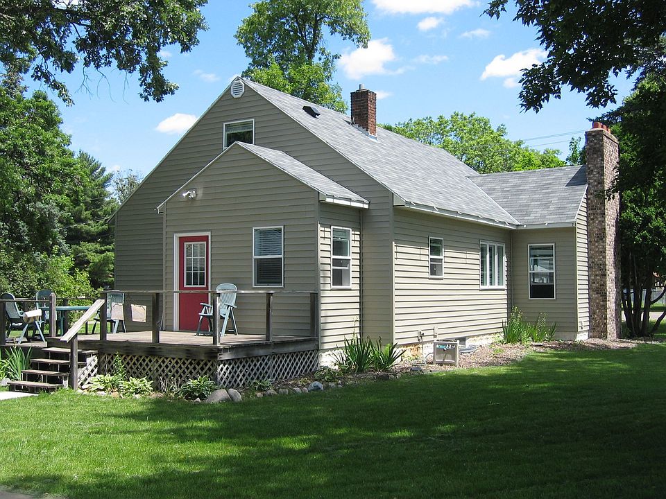 Fully updated home on nearly half acre, blocks from 2 lakes