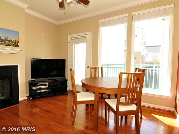 Main living area opens onto balcony.