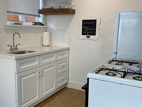 Full size stove and fridge