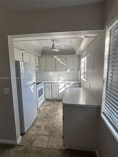 179 W Canterbury Dr #H Photo 1